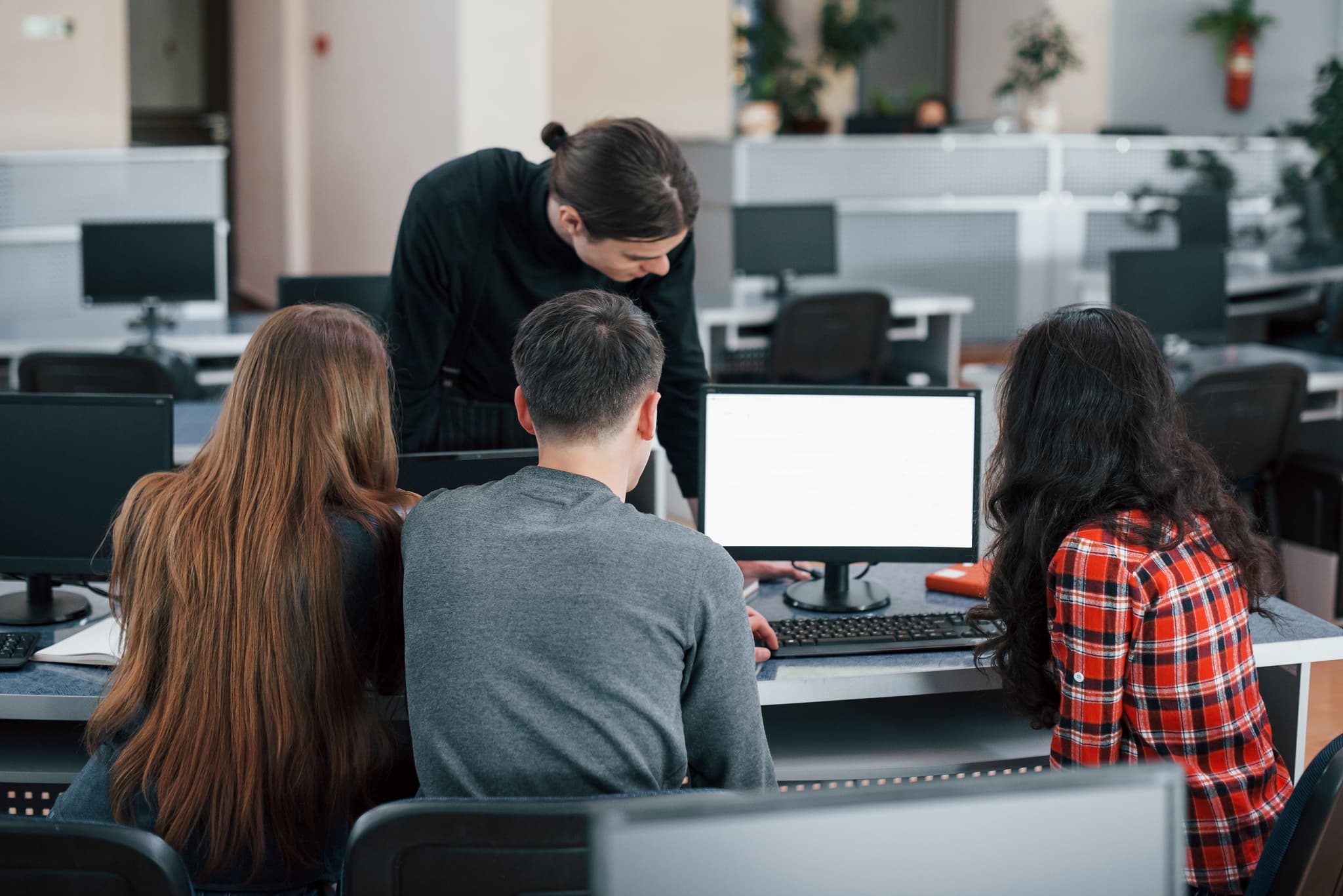 Group of young people working in a modern office
